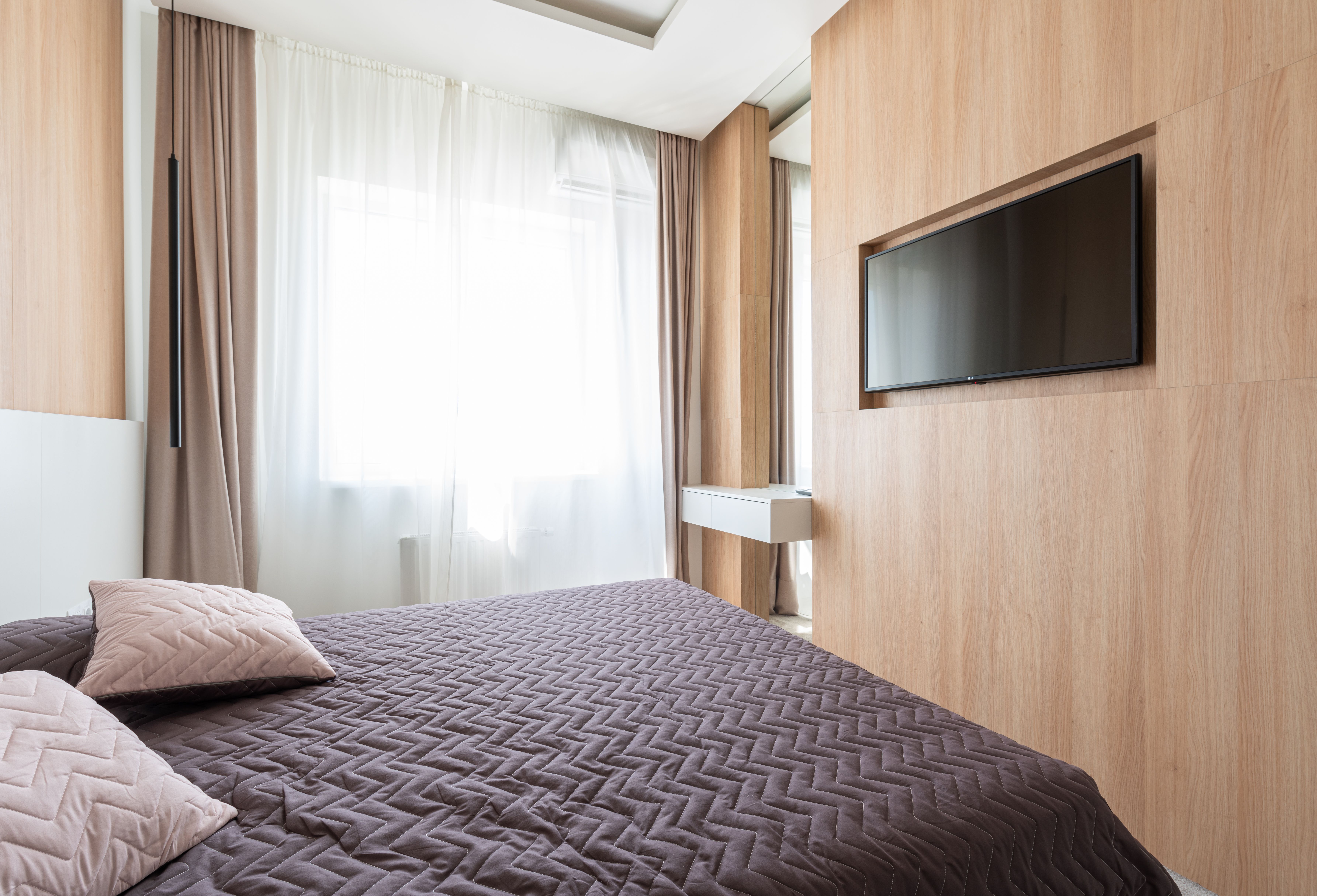 Chambre aménagée avec décor mural et ambiance enveloppante, vue 6.